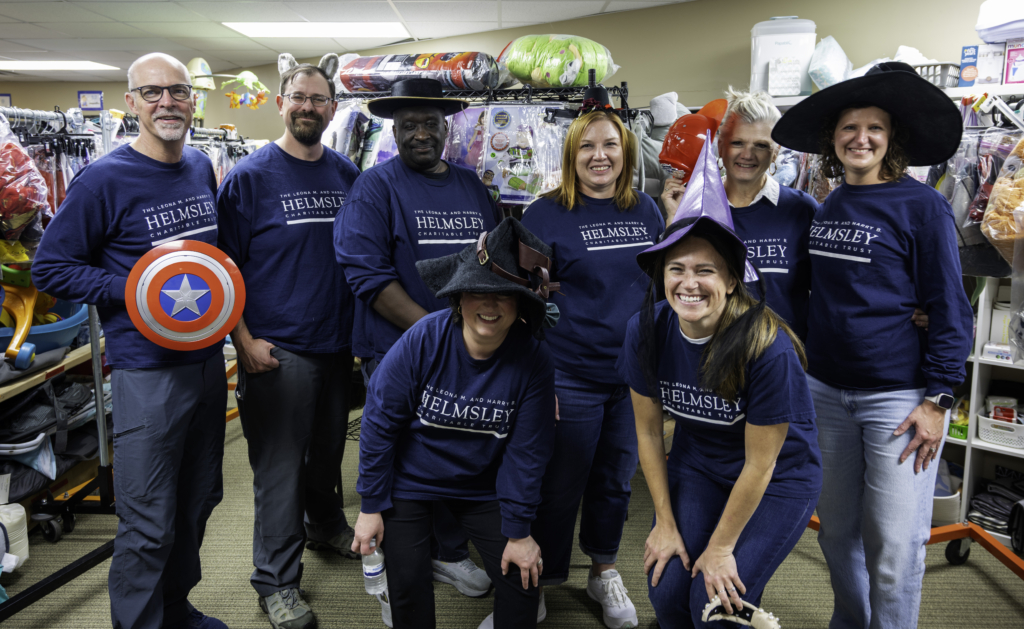 Helmsley staff sorting Halloween costumes.